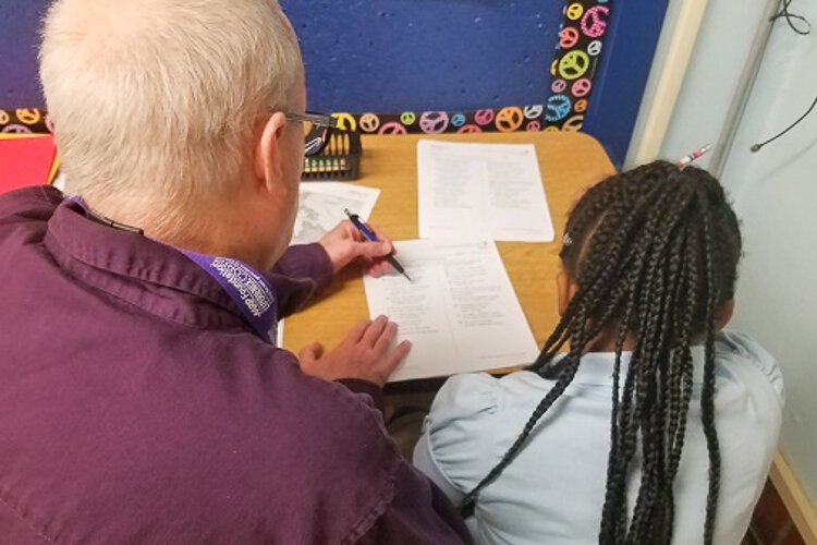 Chris Evans and student using Comprehension Questions